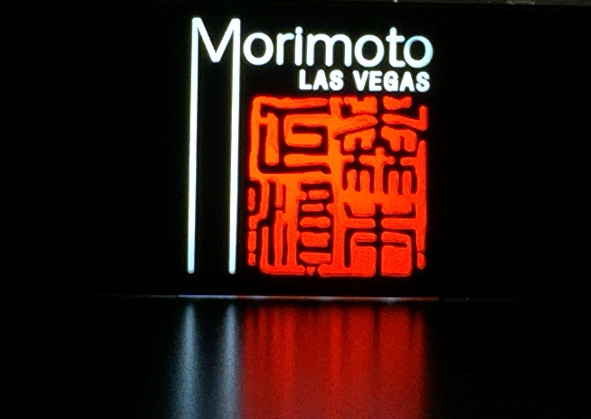 laser cutting Morimoto Logo in LED laser cutting Morimoto Logo in LED